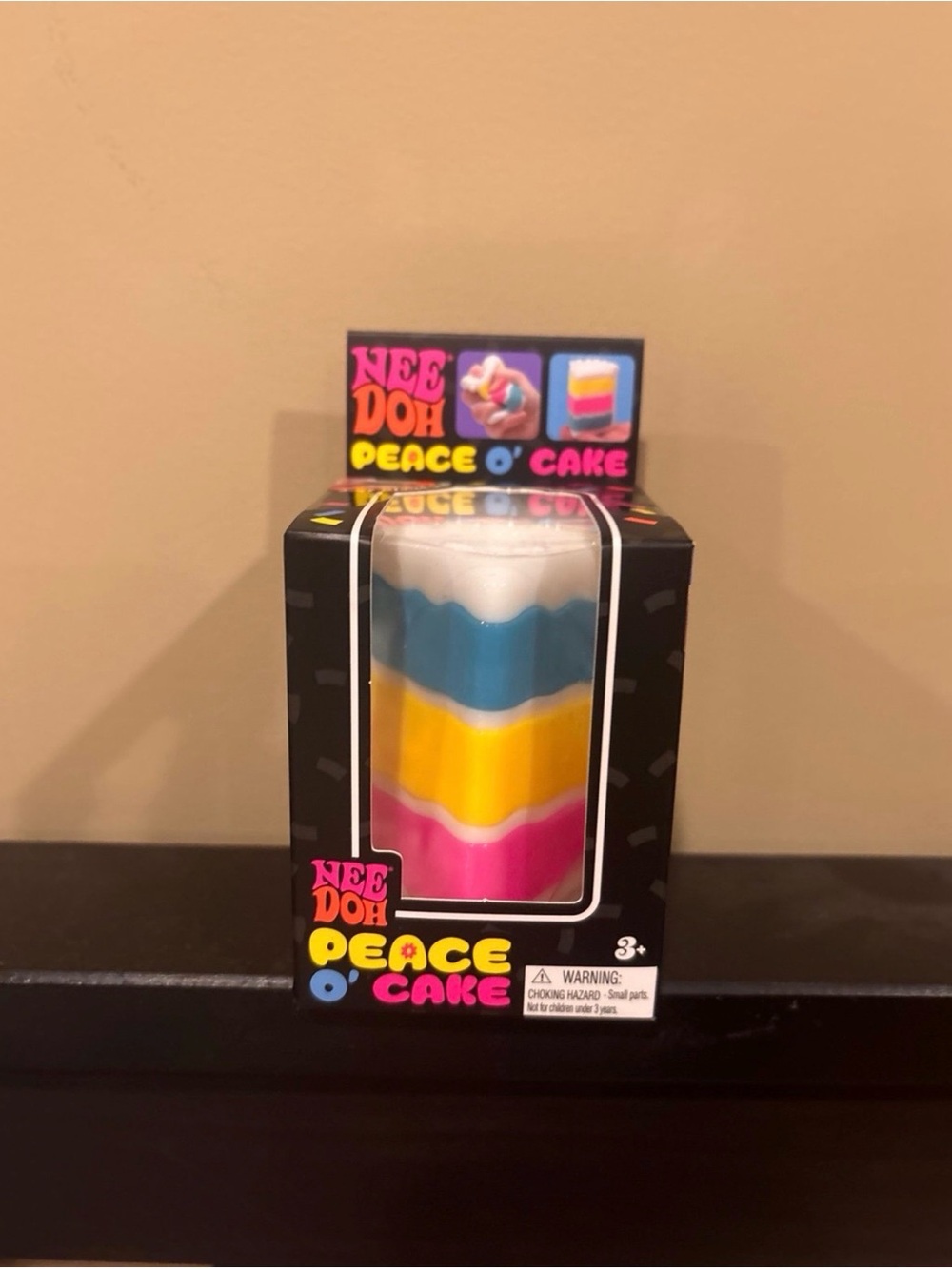 Nee Doh Peace O' Cake Layered Squeeze Toy - Pink, Yellow, Blue, White